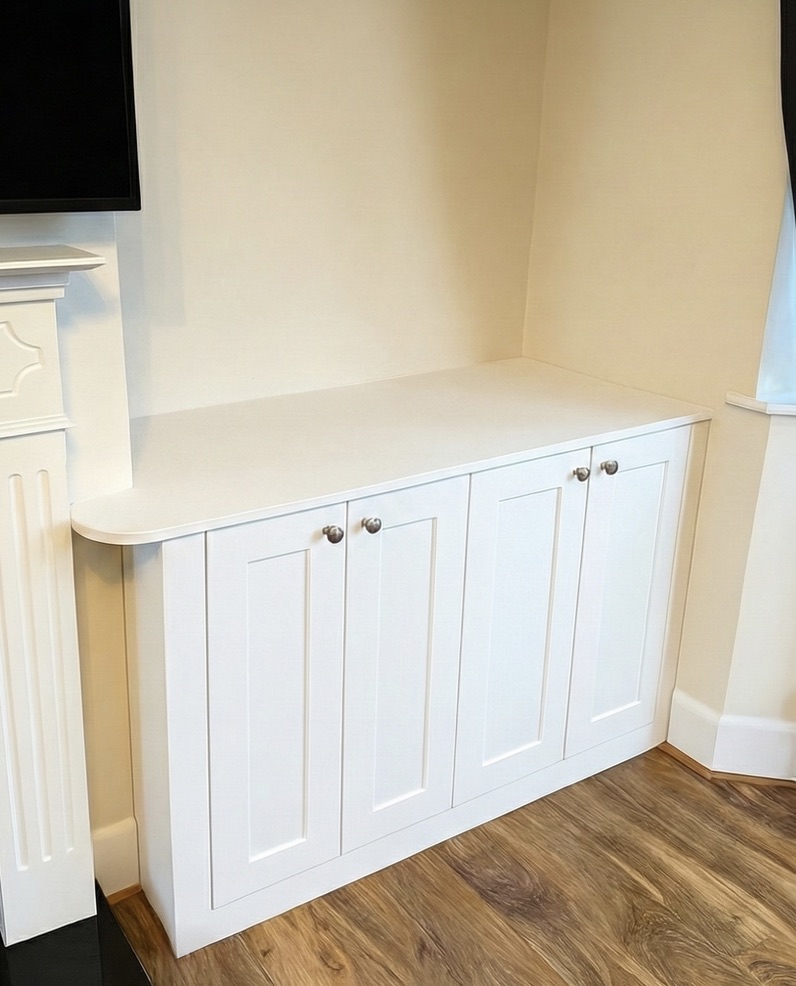 Custom bespoke storage solution fitted to an alcove